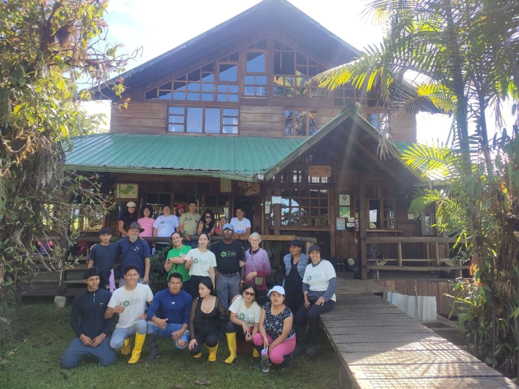 Los Cedros Scientific Station staff with Santa Lucía Reserve staff outside the lodge