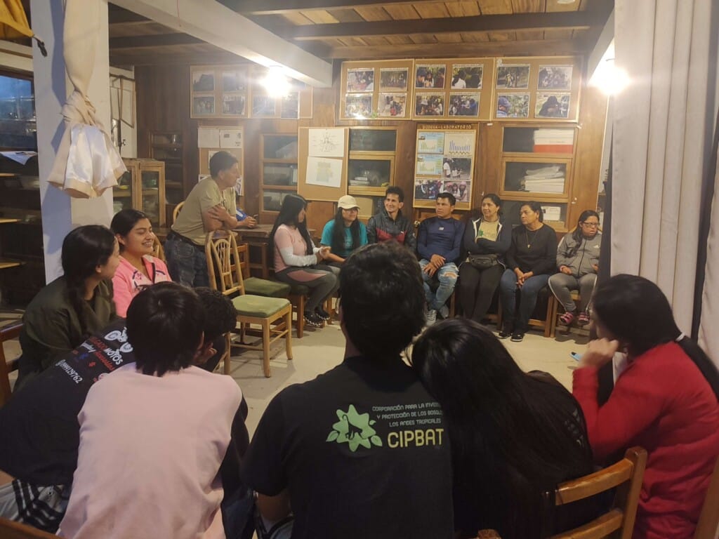 Los Cedros Scientific Station staff with Santa Lucía Reserve staff inside lodge